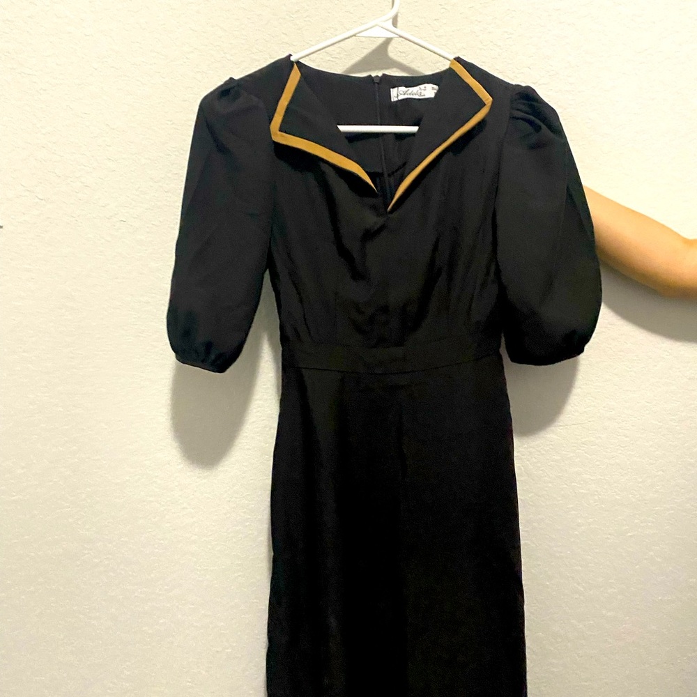 Adela’s Black Dress